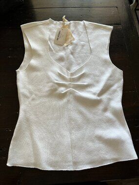 Soft, knit, ruched cream top. Size L.